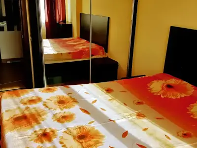 Apartament inchiriere Sector 2 Bucuresti dormitor cu oglinda